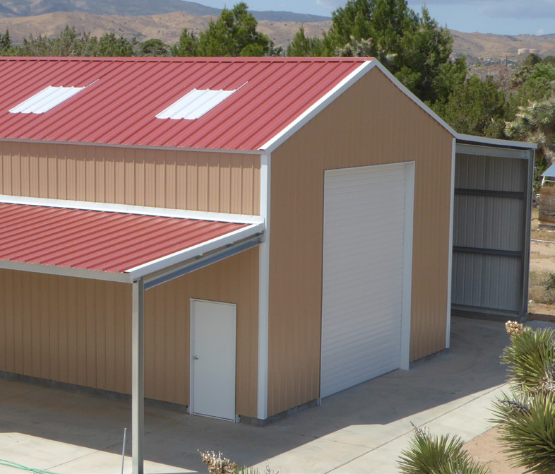 Tan steel shop with lean-to