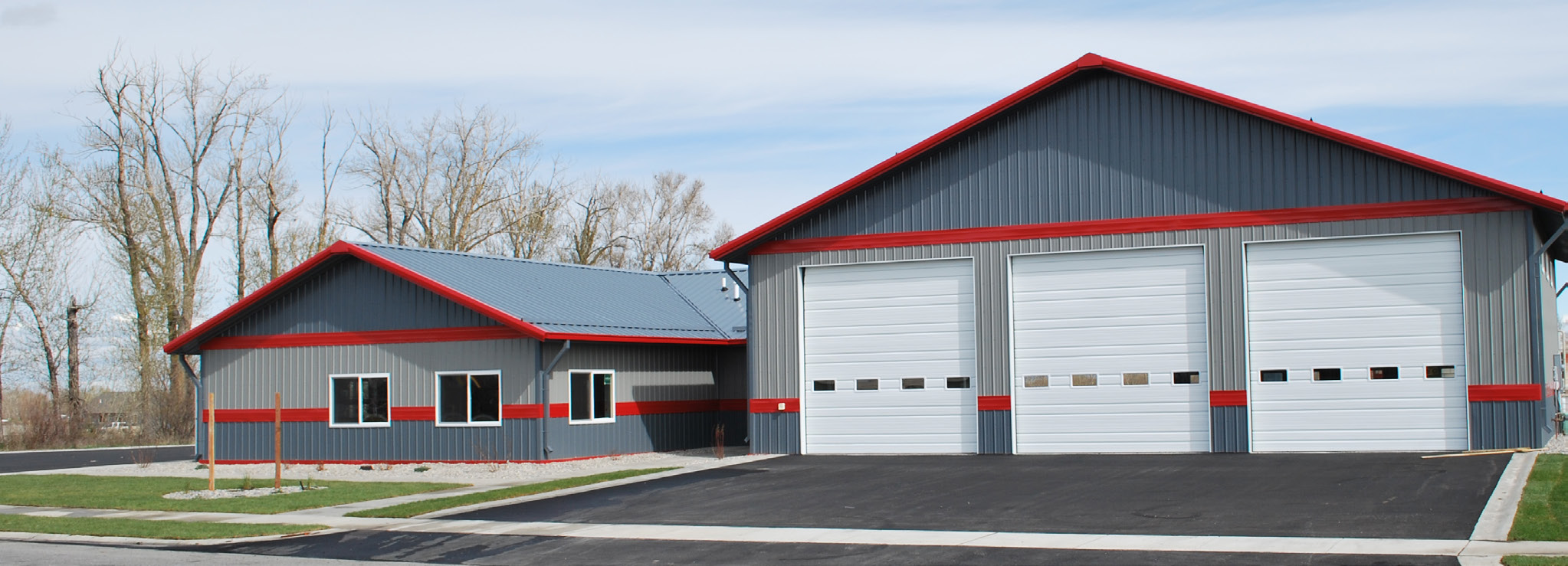 Commercial steel garage with three bay doors